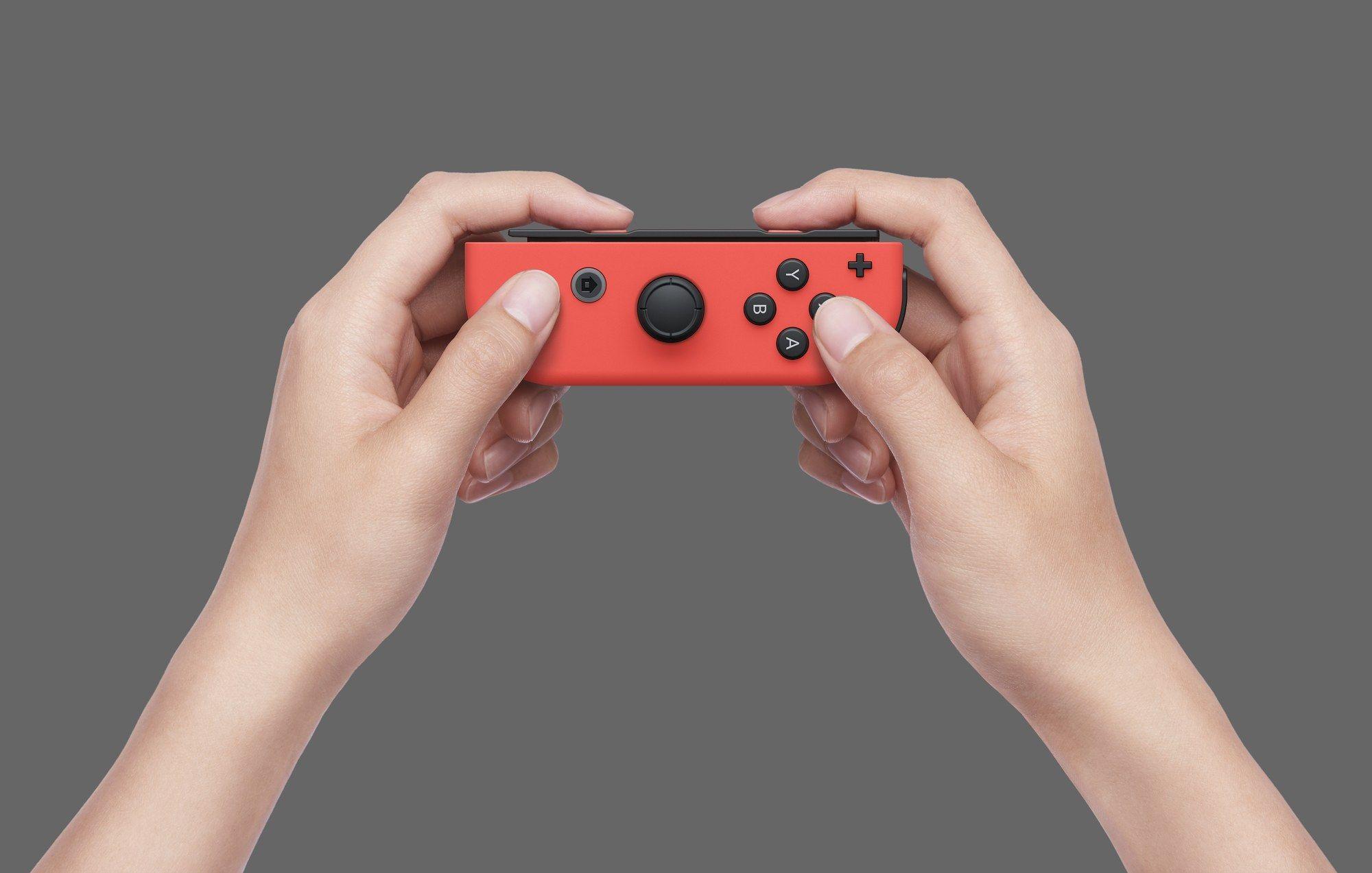 Consola Portátil NINTENDO Switch OLED (NVIDIA - 64 GB - 7" - Azul e Vermelho Neon) — miniatura 7